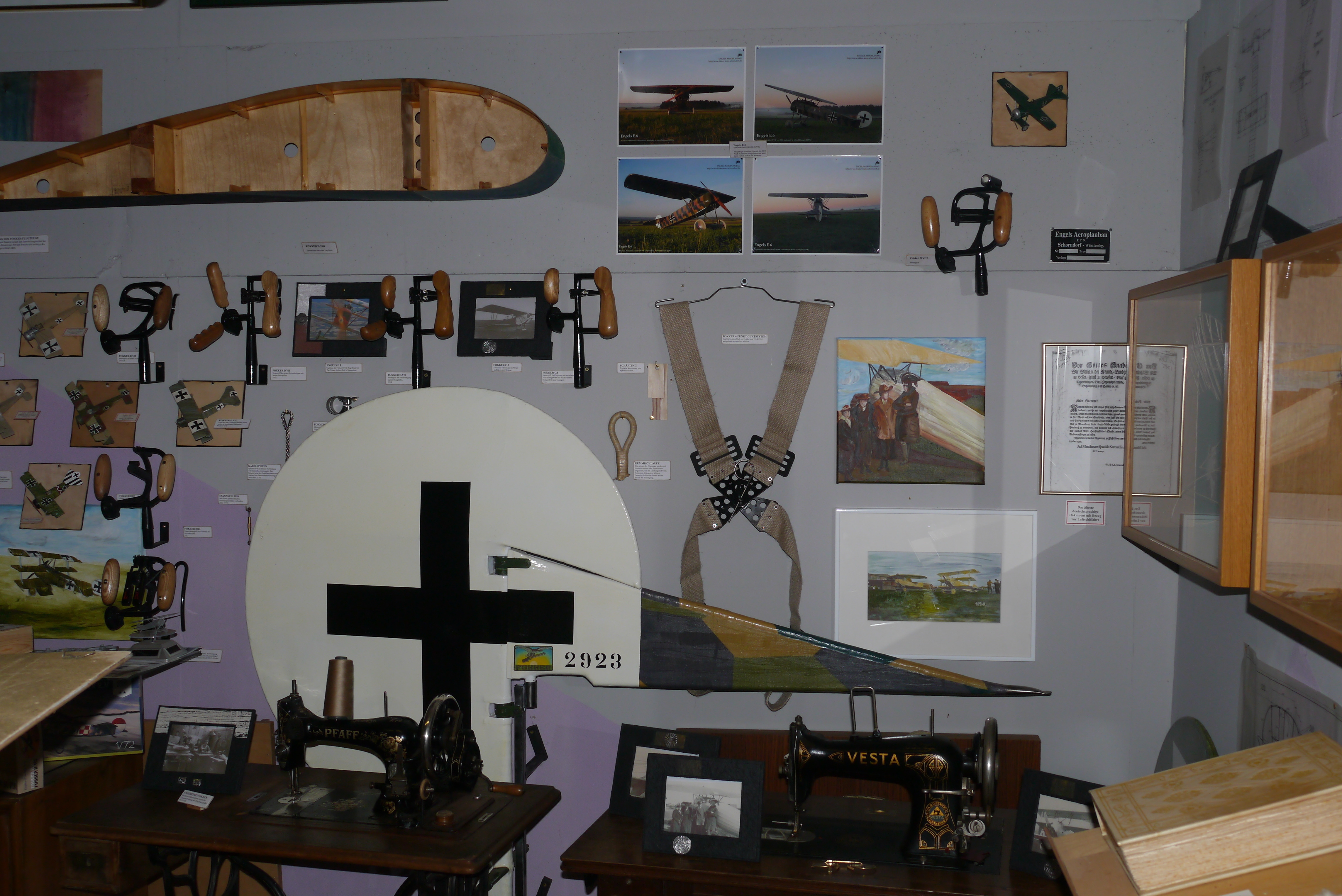 The newly decorated wall featuring the development of the control grips and other aircraft design features along with several wing ribs and wing segments.
