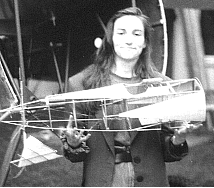 Renate Engels holds the 1:6 scale model fuselage